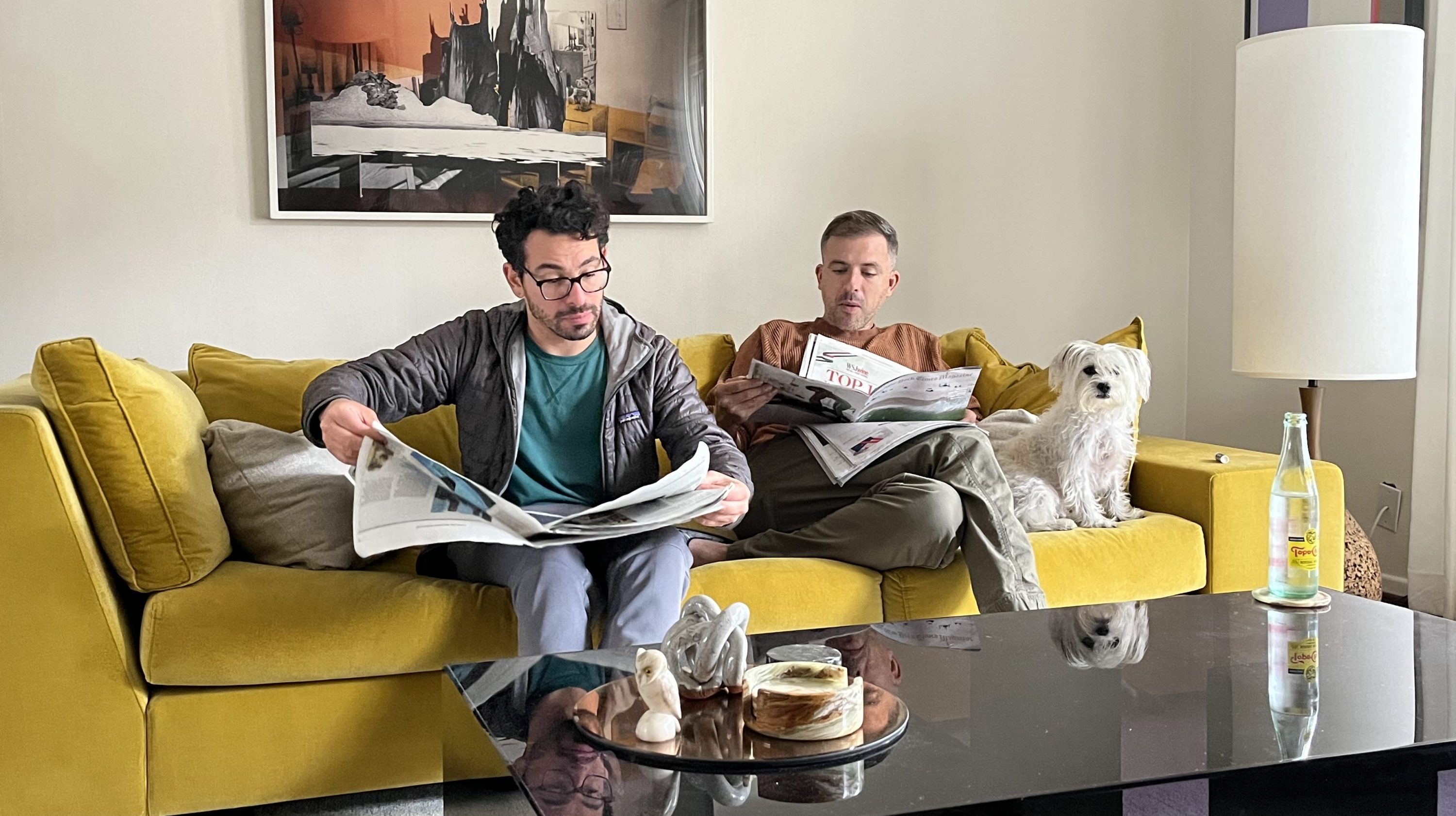 Artist Amir Nikravan (left) and the author (center) in their former home — with Jasper (right, still alive) on the couch he so loved to defile.