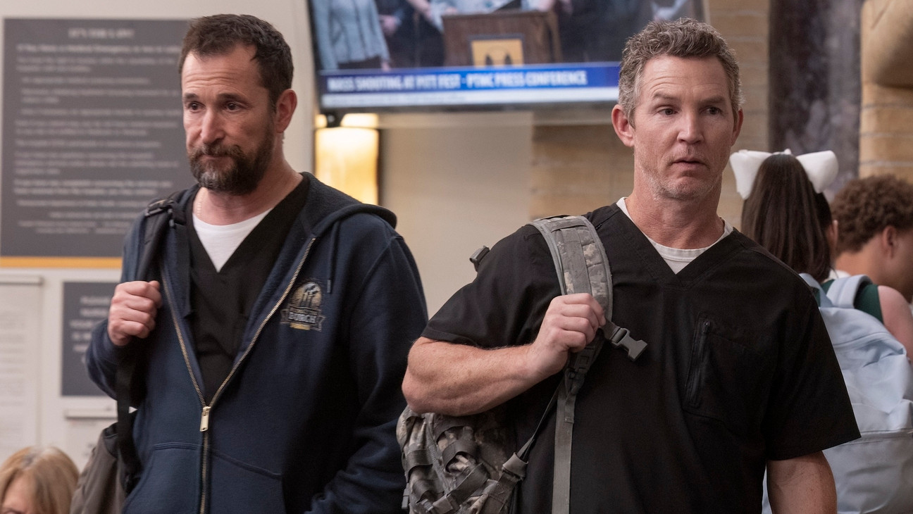 Noah Wyle's Dr. Robby and Shawn Hatosy's Dr. Abbot walking out of the hospital at the end of 'The Pitt's' first season finale.